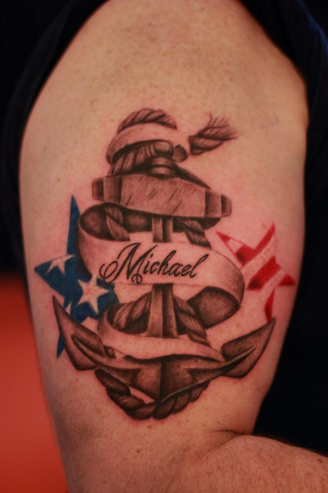 Michael Banner With Anchor Memorial Tattoo On Bicep
