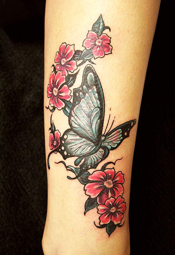 Nice Butterfly With Flowers Tattoo On Leg