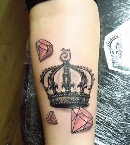 Nice Crown And Pink Diamond Tattoos On Forearm