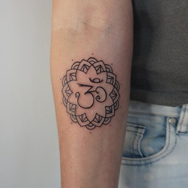 Om Symbol In Mandala Flower Tattoo On Forearm