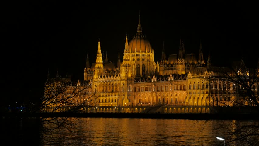 Parliament Building Of Hungary In Budapest At Night