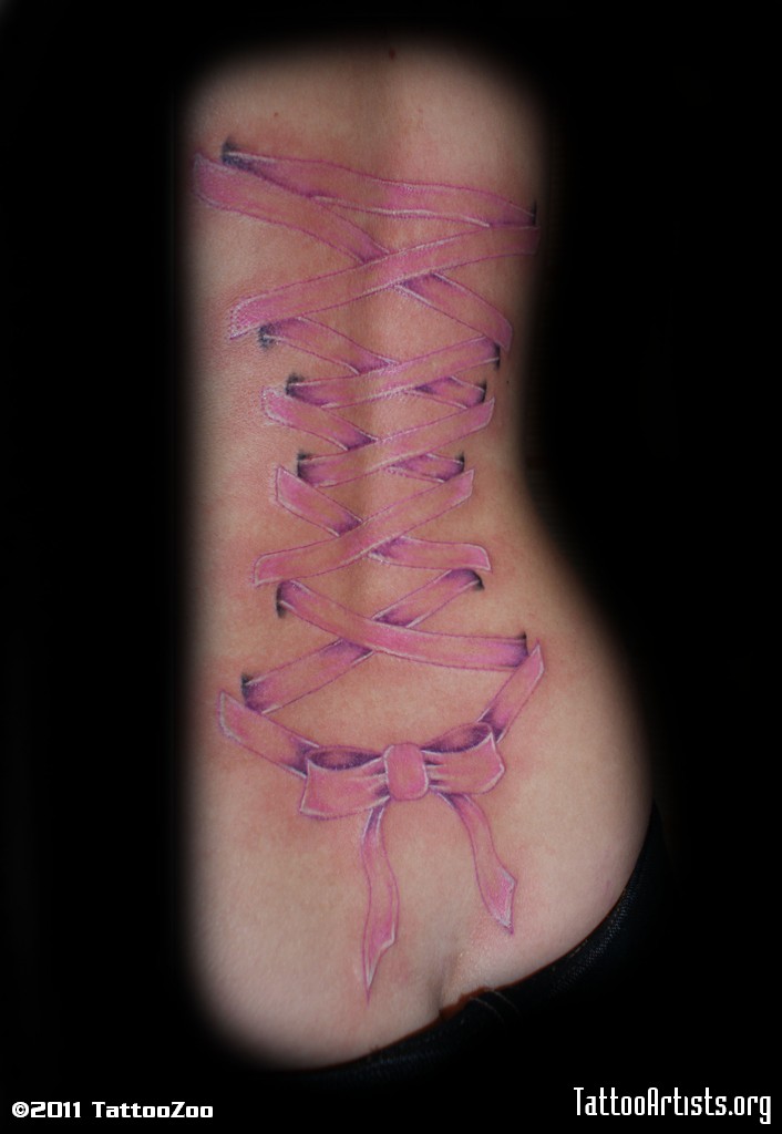 Pink Ink Corset With Bow Tattoo On Full Back