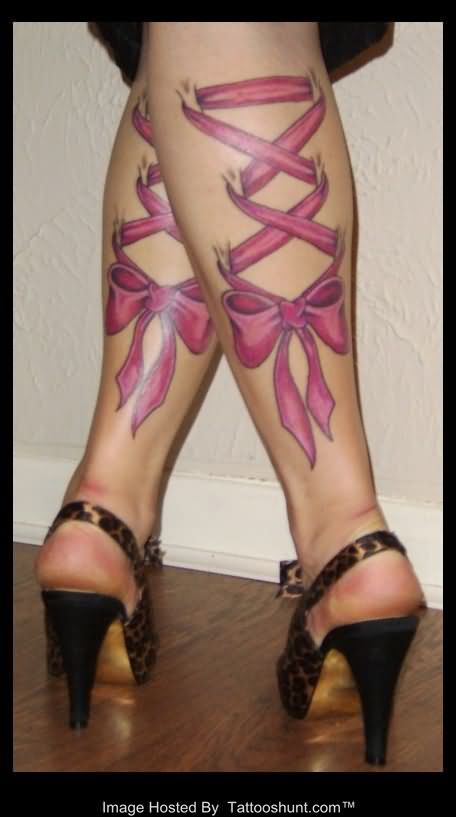 Pink Ink Corset With Bow Tattoo On Girl Both Leg Calf