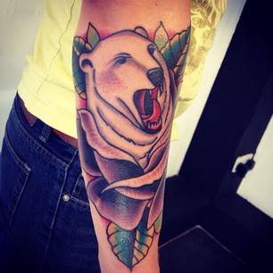 Polar Bear With Rose Tattoo On Right Arm By Sam Ricketts