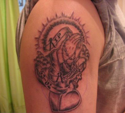 Praying Hands And Memorial Tattoo On Right Bicep