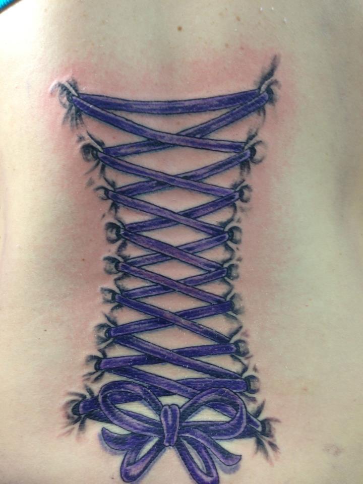 Purple Ink Corset With Bow Tattoo On Back