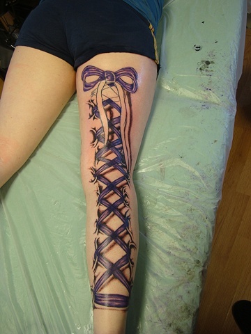 Purple Ink Corset With Bow Tattoo On Right Full Back Leg