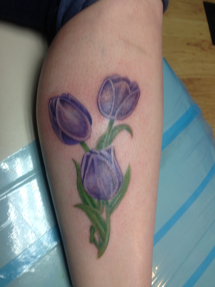 Purple Tulip Flowers Tattoo On Side Leg