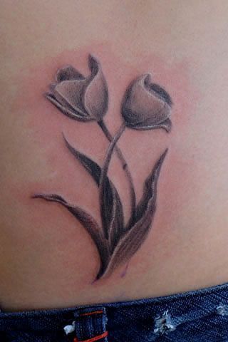 Realistic Grey Dutch Tulip Tattoo On Lower Back