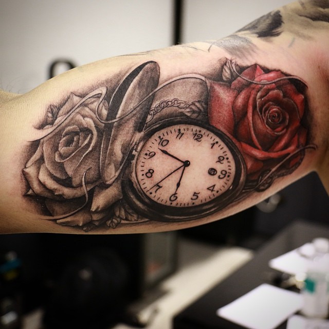 Realistic Pocket Watch And Rose Memorial Tattoo On Bicep