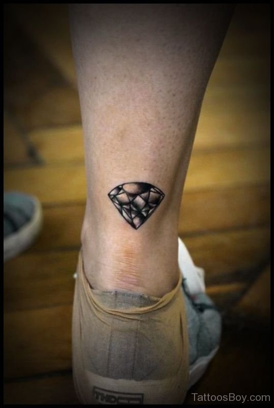 Realistic Small Diamond Tattoo On Back Leg