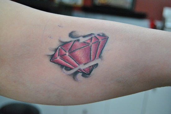 Red Diamond Tattoo On Side Arm
