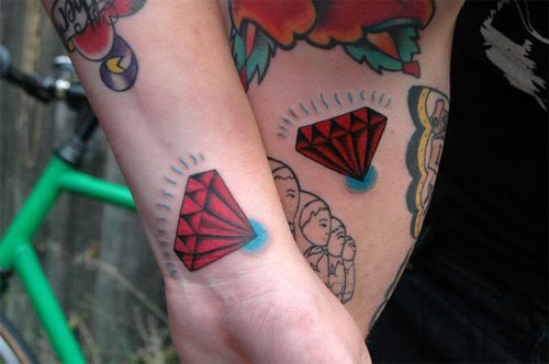 Red Diamond Tattoos On Wrist And Leg