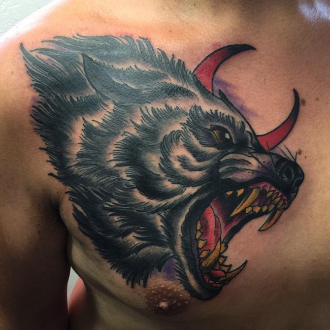 Red Half Moon And Angry Wolf Tattoo On Man Chest