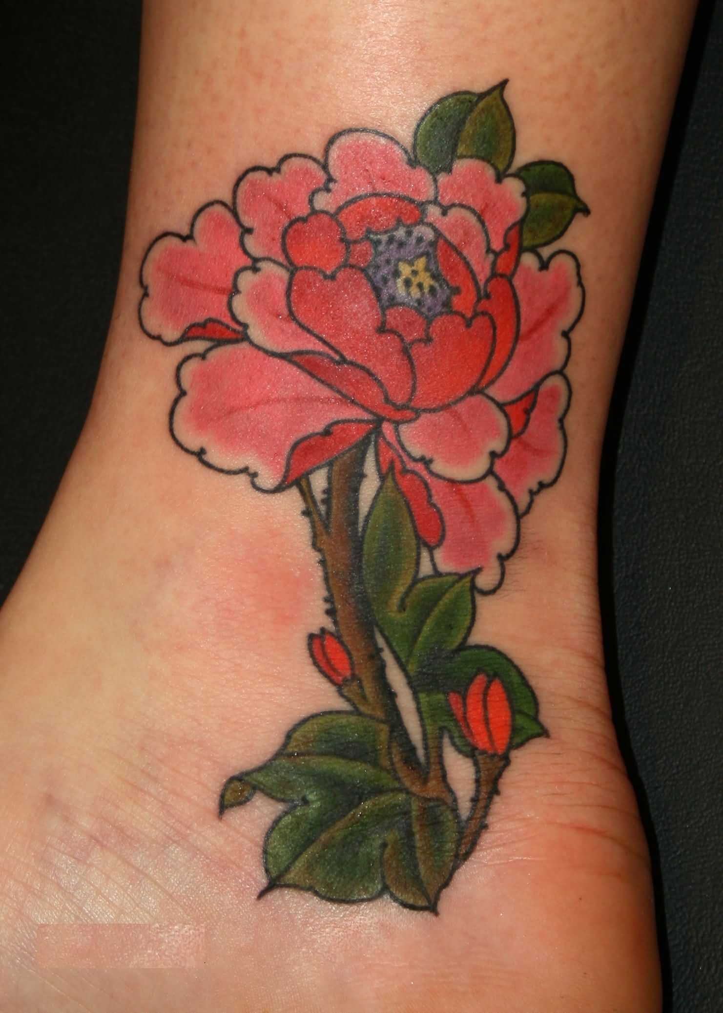 Red Ink Traditional Peony Flower Tattoo On Ankle