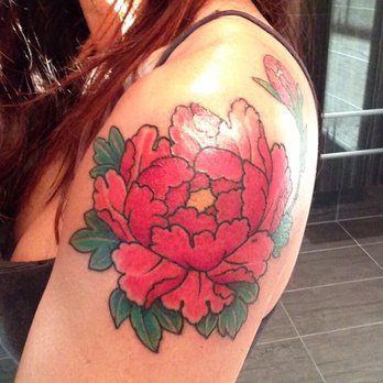 Red Ink Traditional Peony Flower Tattoo On Women Left Shoulder