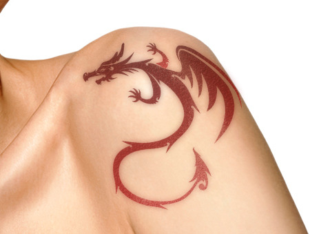 Red Ink Tribal Dragon Tattoo On Left Shoulder