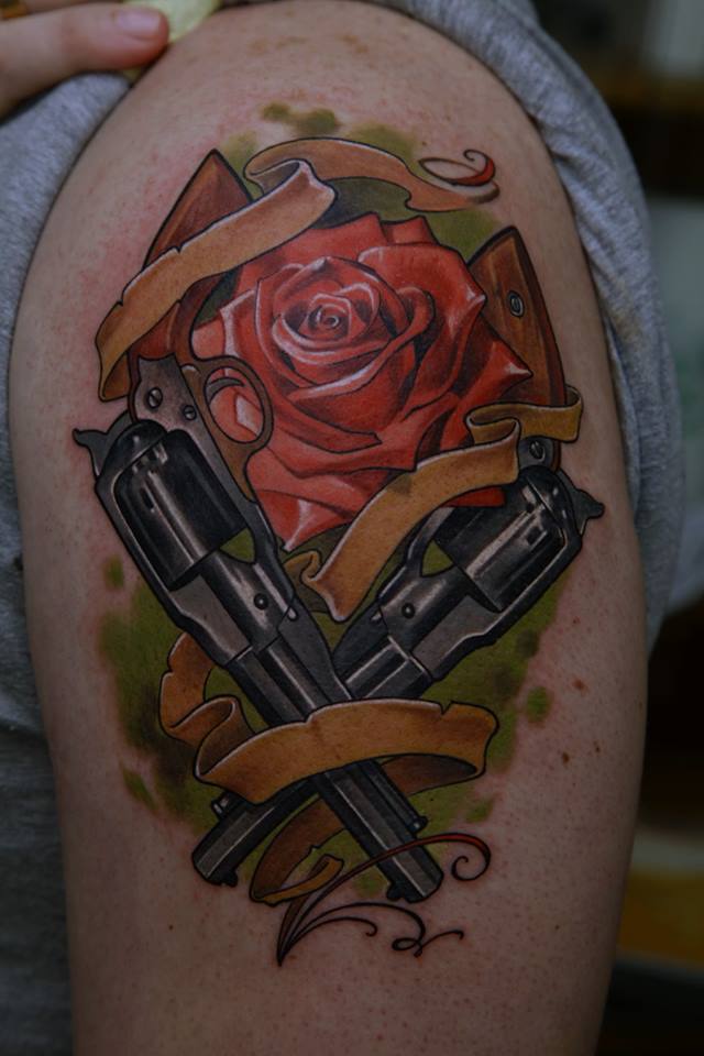 Red Rose With Two Guns And Ribbon Tattoo On Shoulder By Dmitriy Samohin
