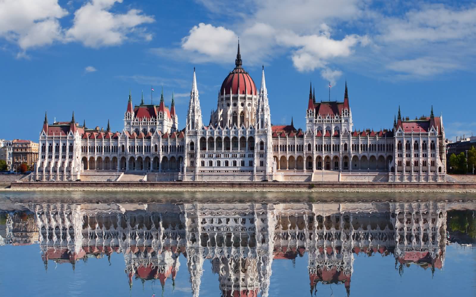 Reflection Of Hungarian Parliament Building In Danube River