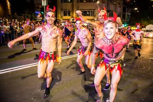 Revelers Performing During The Mardi Gras Parade