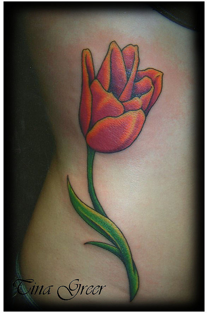 Rib Side Tulip Tattoo For Young Girls