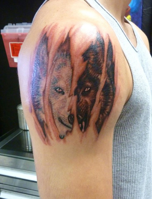 Ripped Skin Wolf Tattoos On Right Shoulder