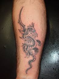 Simple Black Ink Dragon Tattoo On Forearm