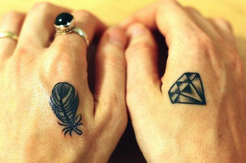 Small Feather And Diamond Tattoos On Both Hands