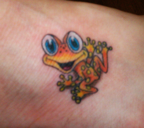 Small Orange Frog Tattoo On Foot