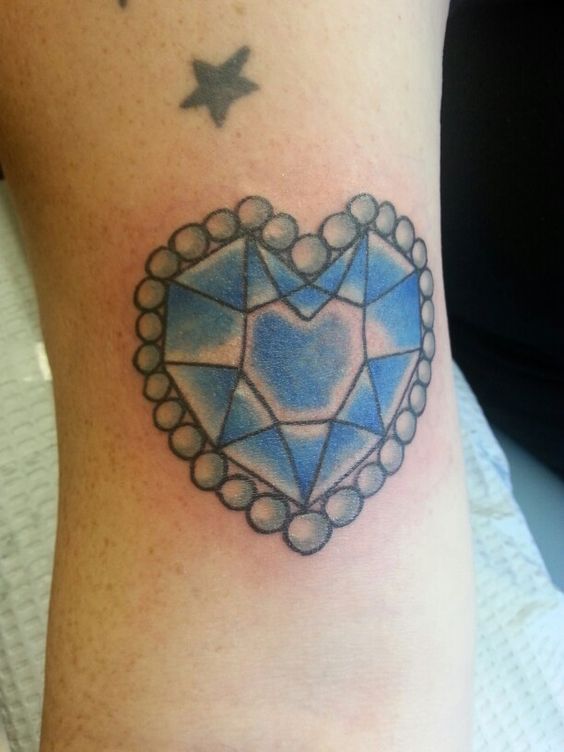 Small Star And Diamond Tattoo On Bicep