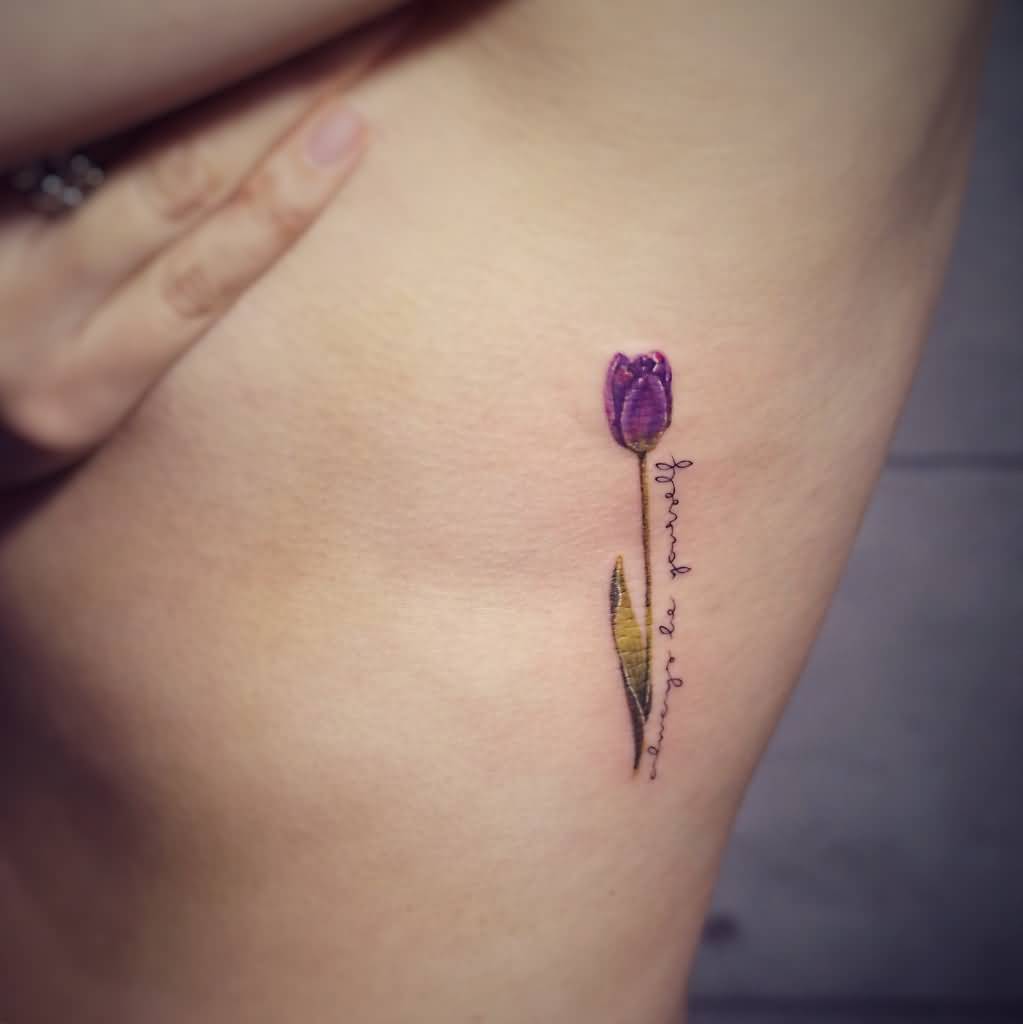 Small Tulip Tattoo On Girl Side Rib