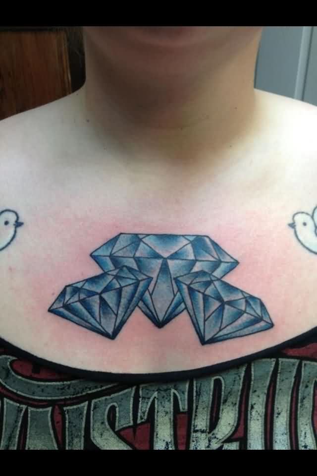 Three Blue Diamond Tattoos On Girl Chest