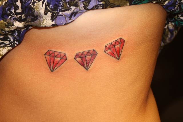 Three Red Diamond Tattoos On Girl Side Neck