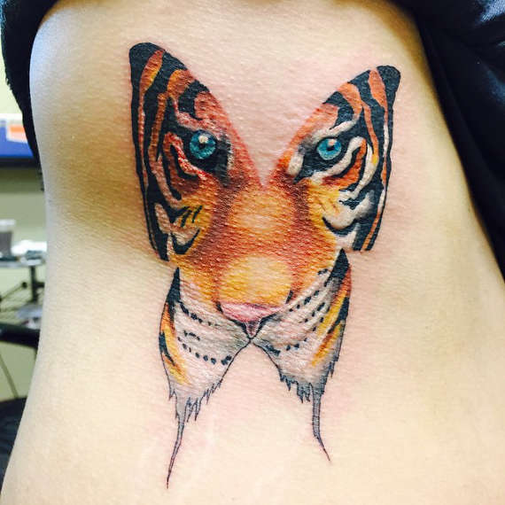 Tiger Face In Butterfly Tattoo On Side Rib