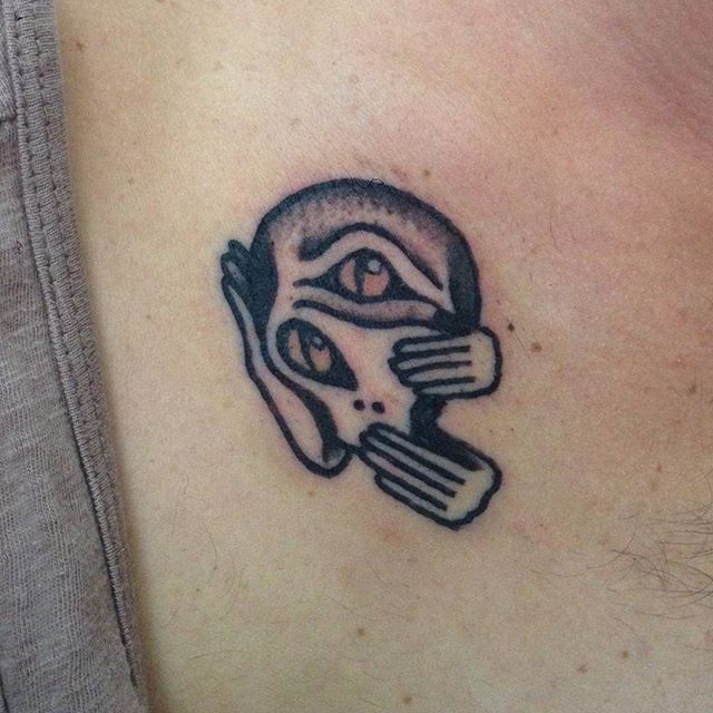Traditional Alien Head Tattoo On Right Side Rib