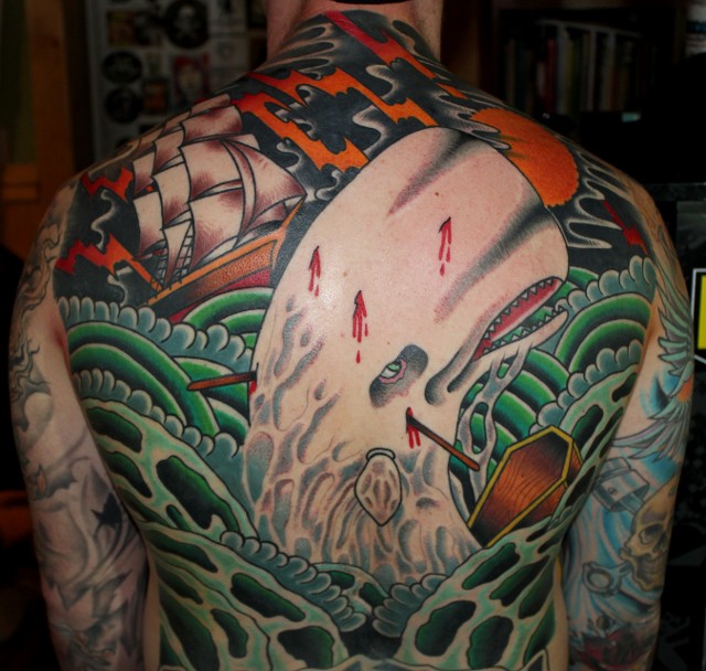 Traditional Arrows In Whale With Ship Tattoo On Man Full Back