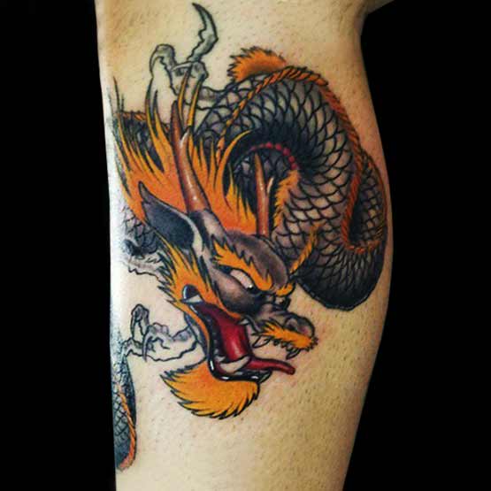 Chinese dragon tattoo on legs