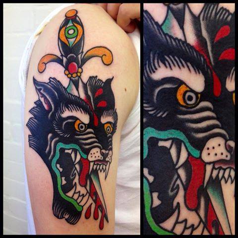 Traditional Dagger In Animal Head Tattoo On Right Half Sleeve