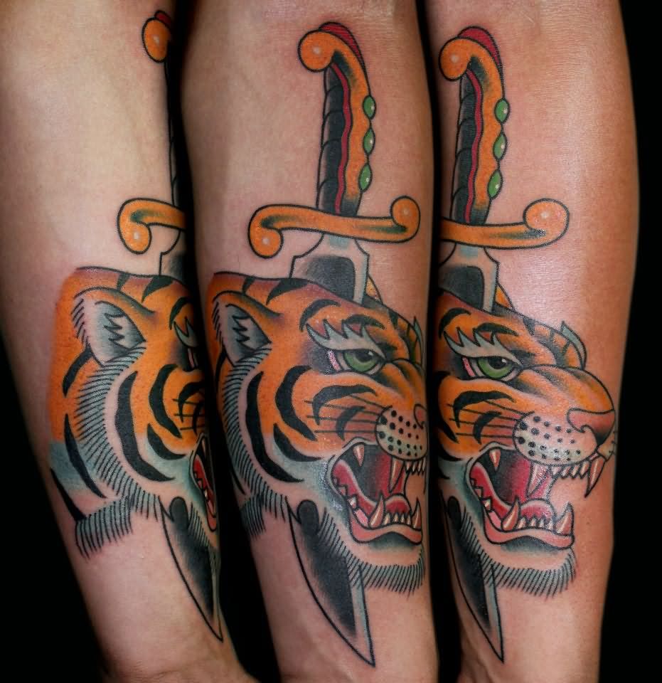 Traditional Dagger In Tiger Head Tattoo On Forearm