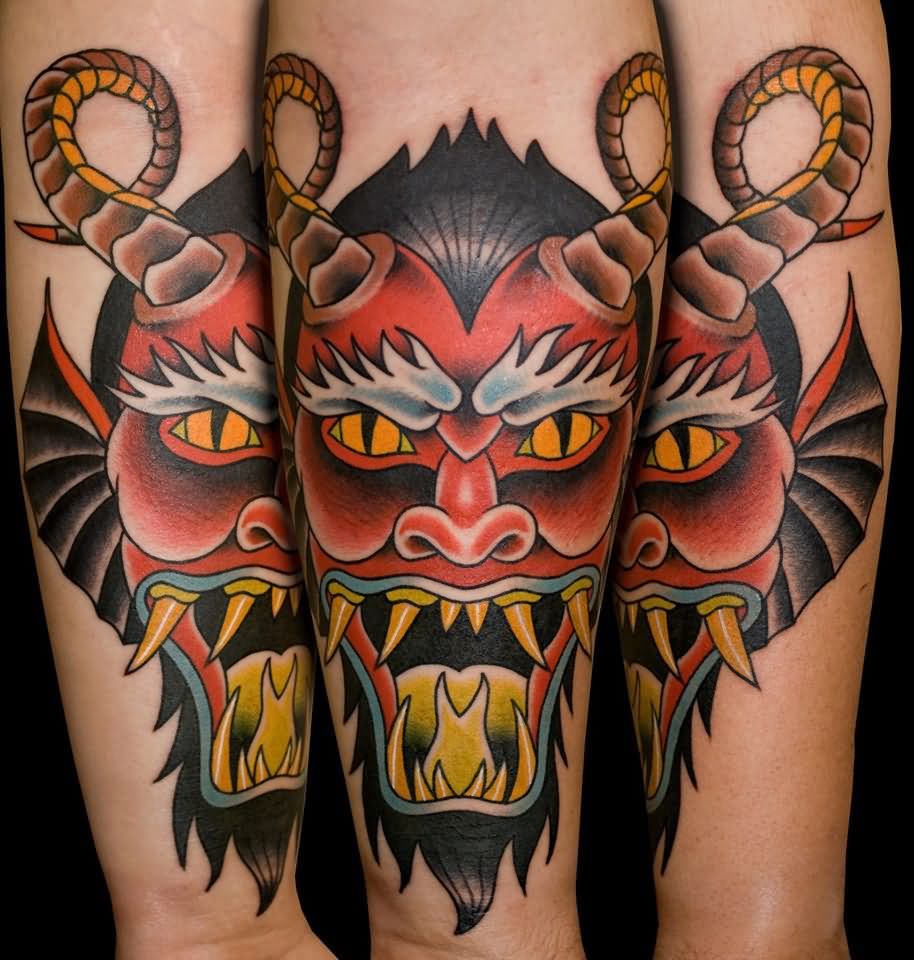 Traditional Demon Head Tattoo On Forearm