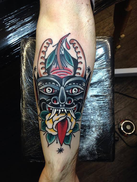 Traditional Demon With Rose Tattoo On Left Arm By Sam Ricketts