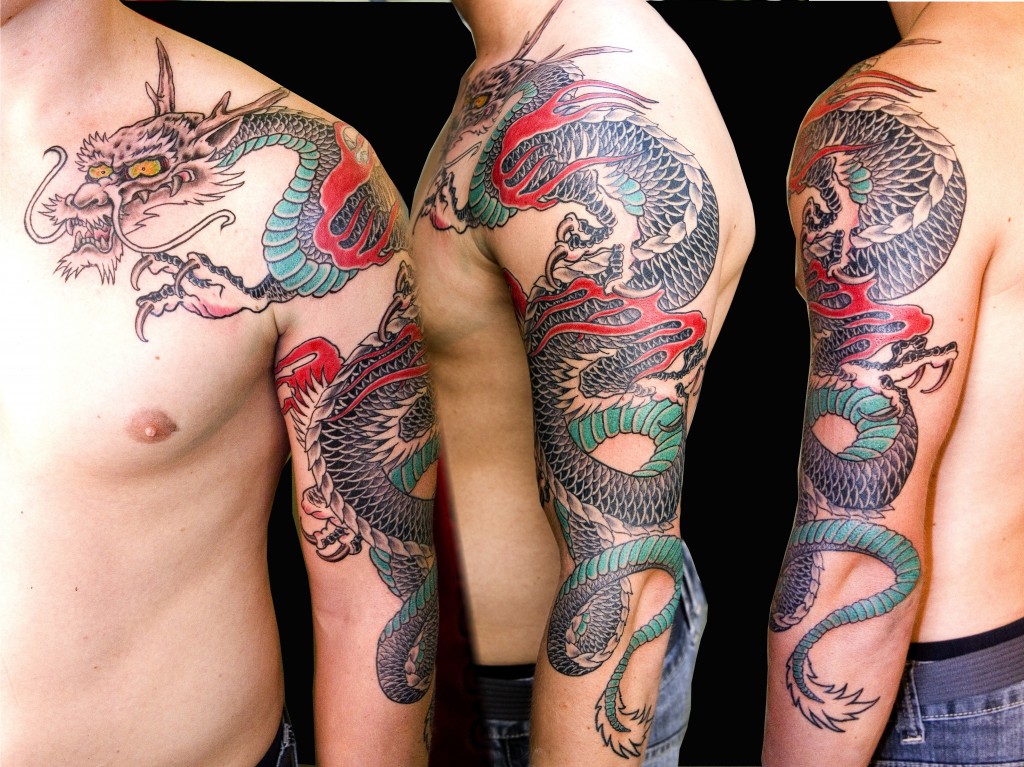 Traditional Dragon Tattoo On Man Left Half Sleeve And Front Shoulder