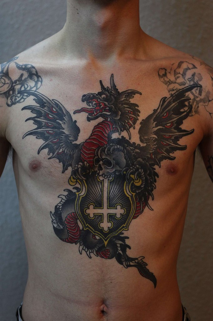 Traditional Dragon With Cross Tattoo On Man Chest