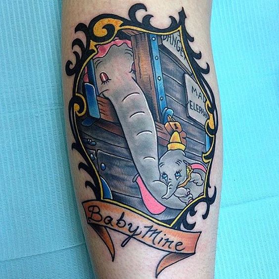 Traditional Dumbo And Mother In Frame With Banner Tattoo Design For Half Sleeve