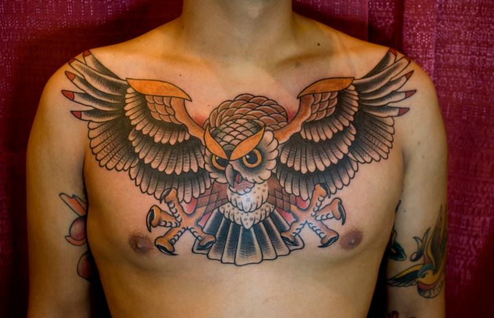 Traditional Flying Owl Tattoo On Man Chest By Myke Chambers