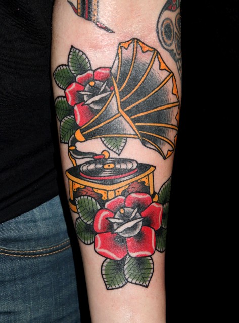 Traditional Gramophone With Roses Tattoo On Forearm
