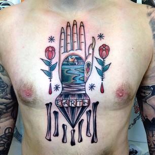 Traditional Hand With Diamond Tattoo On Man Chest By Sam Ricketts