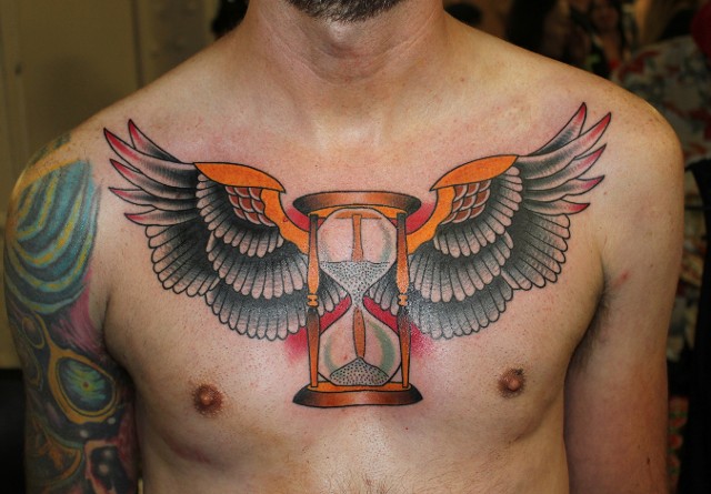 Traditional Hourglass With Wings Tattoo On Man Chest By Myke Chambers