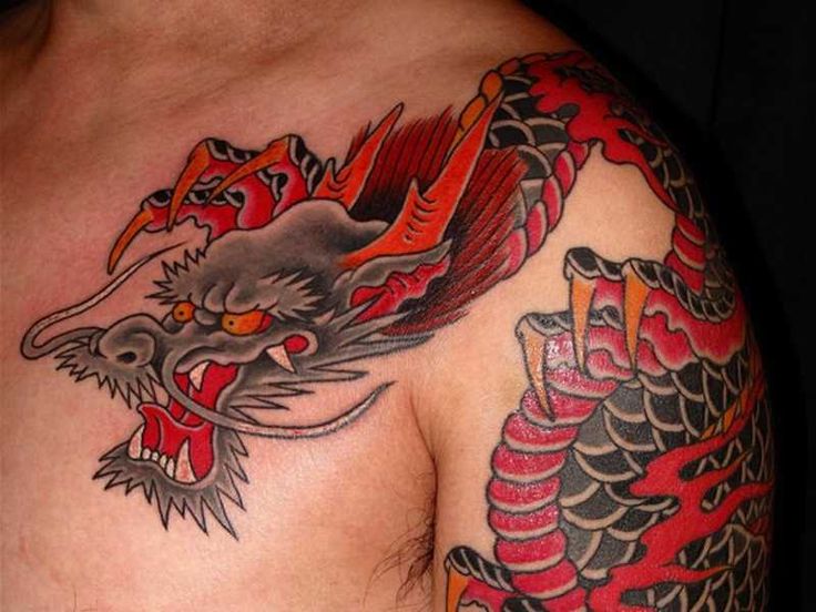 Traditional Japanese Dragon Tattoo On Man Left Shoulder And Chest