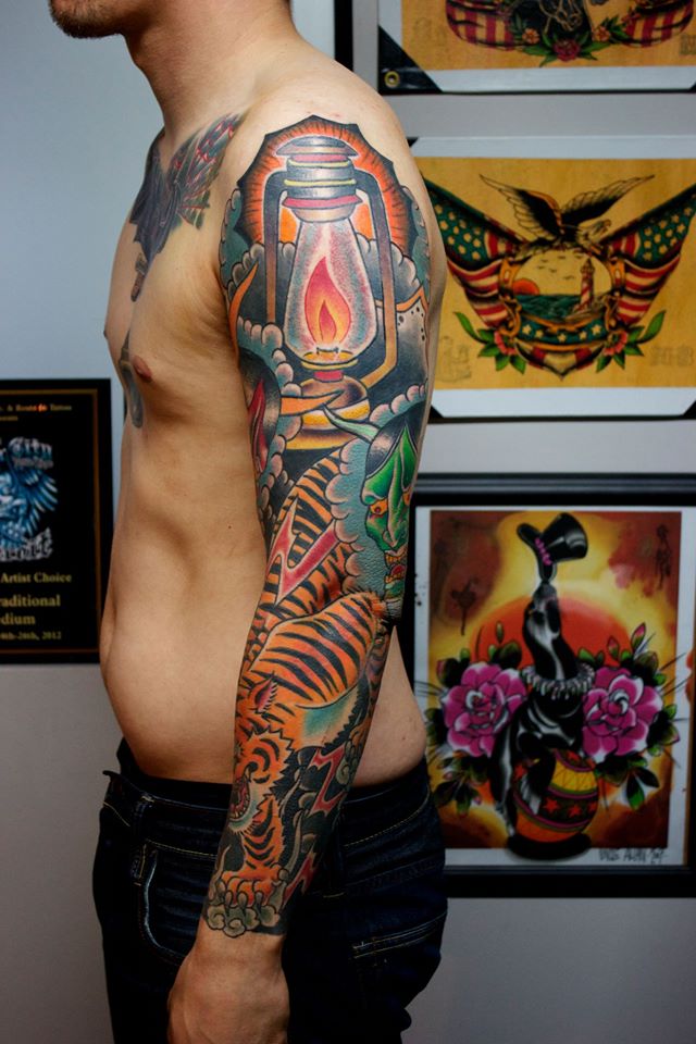 Traditional Lalten With Tiger Tattoo On Man Left Full Sleeve
